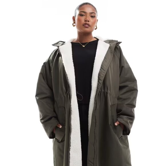 ASOS DESIGN Curve Teddy Lined Longline Rain Coat in Khaki - Picture 1 of 6